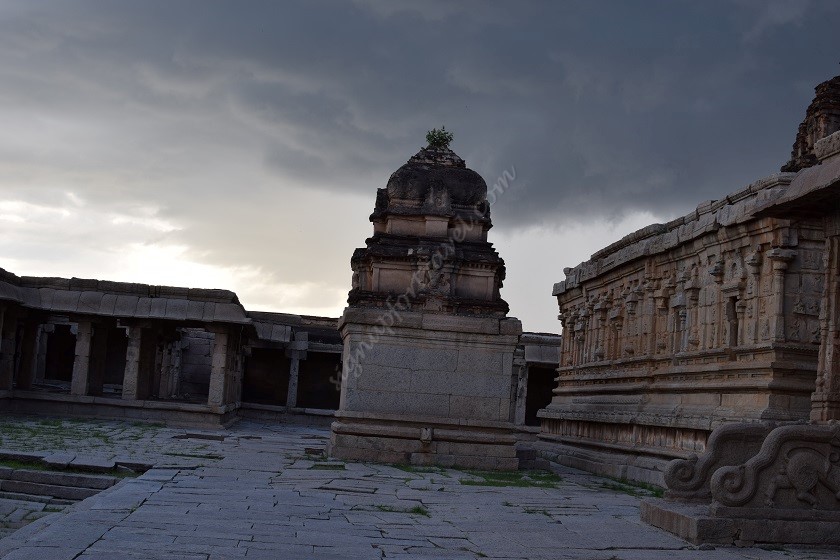 Krishna temple against dark skies at Hampi