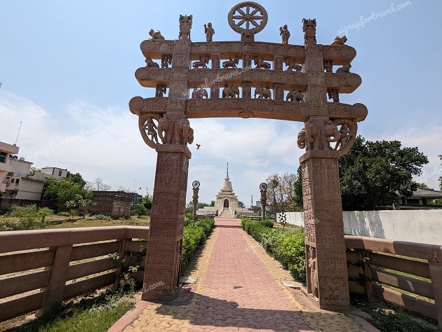Torna Gate and Lawns with Ashoka Pillars at Vishwa Shanti Stupa in Sarnath
